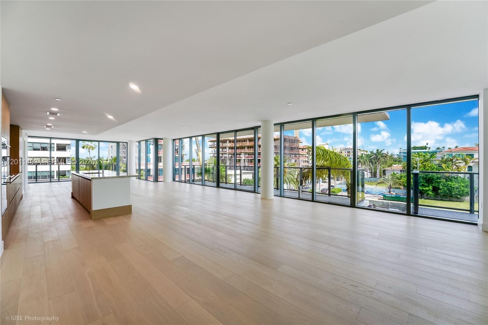 WELLNESS AT THE CORE OF THE ONLY AVAILABLE LARGEST 3 BEDROOM 05 LINE AT THE WELL BAY HARBOR ISLANDS, a boutique building shaped around health and longevity. This wellness-driven community is now completed and ready for move-in! Spanning 3,671 sq ft, Residence 405 unfolds with a spacious split floor plan, anchored by an oversized entertainment area that feels like a single family residence, with floor-to-ceiling doors that fill the interiors with natural light. 3 private terraces extend the living spaces, creating indoor-outdoor flow to live, host, and unwind. Wellness elements are integrated throughout, creating a sense of calm & understated luxury rarely found in new construction: custom wood cabinetry w/ stone countertops, marble & travertine surfaces, spa-inspired details: rain shower, aromatherapy, red light therapy, filtered water, built-in air purification, and non-toxic paint finishes, complemented by Sub-Zero & Wolf appliances. 2 covered parking spaces & 1 storage included. Developed by Terra Group w/ interiors by Meyer Davis, The Well is a limited collection of 65 residences with over 22,000 sq ft of amenities, including a membership to THE WELL Club, offering state-of-the-art fitness and wellness center, infrared saunas, hyperbaric oxygen therapy, cold plunges, 150+ monthly classes, and an onsite functional medicine. Resident only amenities include a rooftop pool deck, zen garden, private beach club access, fitness center, resident lounge, & house car service.