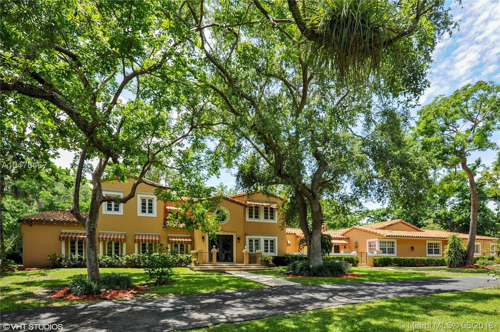 Elegance, charm and ambiance combine to make this Old Spanish 6 bedroom 6.5 bath home on over 2 acres in exclusive Gables Estates a one of a kind! Stunning foyer entry leads to a beautiful large formal living room and dining room. This home has a big, updated eat-in kitchen area and a huge family room with built-ins, perfect for family fun and entertaining. 3 bedrooms downstairs and a fabulous large master suite and 2 other bedrooms upstairs. Volume ceilings, gorgeous wood floors, impact french doors, updated bathrooms, 6 year old barrel tile roof, updated electrical and much more! A must see!