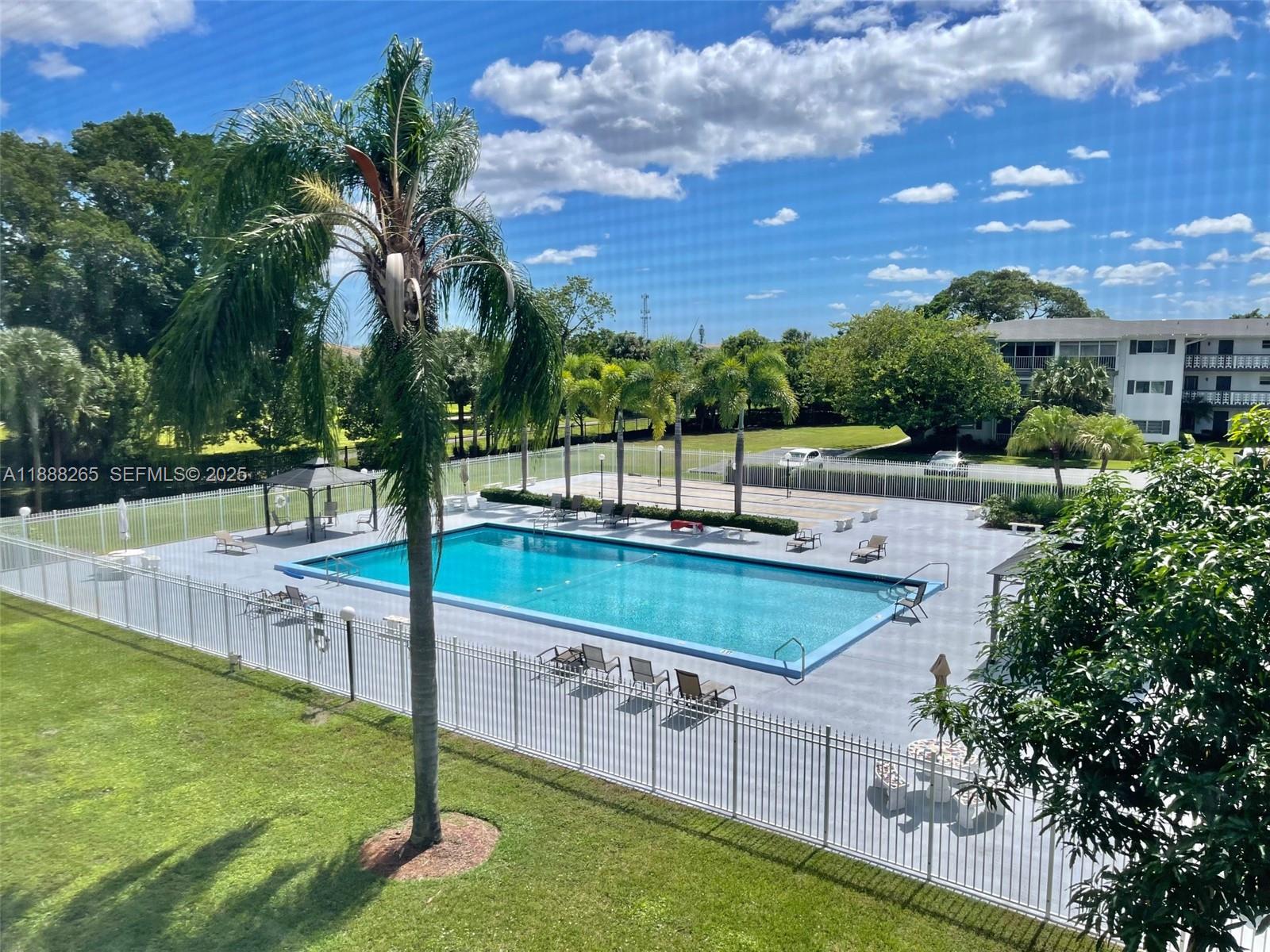Spacious 1/1 with wonderful pool views!  Make this unit your own.  Situated on a lovely cul-de-sac.  Low monthly maintenance.  Steps to miles of walking paths.  Access to tennis courts and pickleball.  Highly sought after Hillcrest unit in the heart of Hollywood.  Close to shopping, restaurants, Ft. Lauderdale Airport, Hardrock Hotel and Casino, Gulfstream Park & Racing, all major highways and the Famous Hollywood Boardwalk. No leasing.  700 credit score per association.