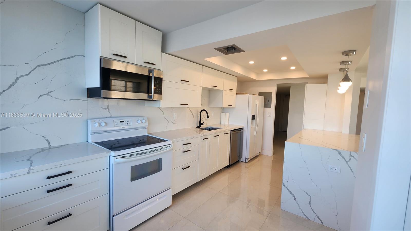 Exceptional opportunity in a rapidly improving Aventura building. Located in one of Aventura's most desirable communities, this fully renovated corner unit is currently leased at $2,600/month, providing immediate rental income from day one. Featuring porcelain flooring, an open-concept kitchen with quartz countertops, spacious light-filled living areas, and stunning city and Intracoastal views from two private balconies. The unit offers two spacious bedrooms with bamboo flooring, including a primary suite with a custom closet, updated bathroom, and balcony access, plus a second fully remodeled bathroom. Residents enjoy resort-style amenities including 24-hour security, two pools, tennis courts, fitness center, sauna, and more. The HOA covers internet, cable, water, building insurance, and 24-hour maintenance with on-site services. Ideally located just minutes from beaches, marinas, dining, Aventura Mall, and Gulfstream Park, this renovated income-producing property offers immediate cash flow, long-term appreciation potential, and the added benefit of major building improvements currently underway. A compelling investment opportunity offering exceptional value in one of South Florida's most sought-after markets. Seller welcomes serious offers.  Act now!