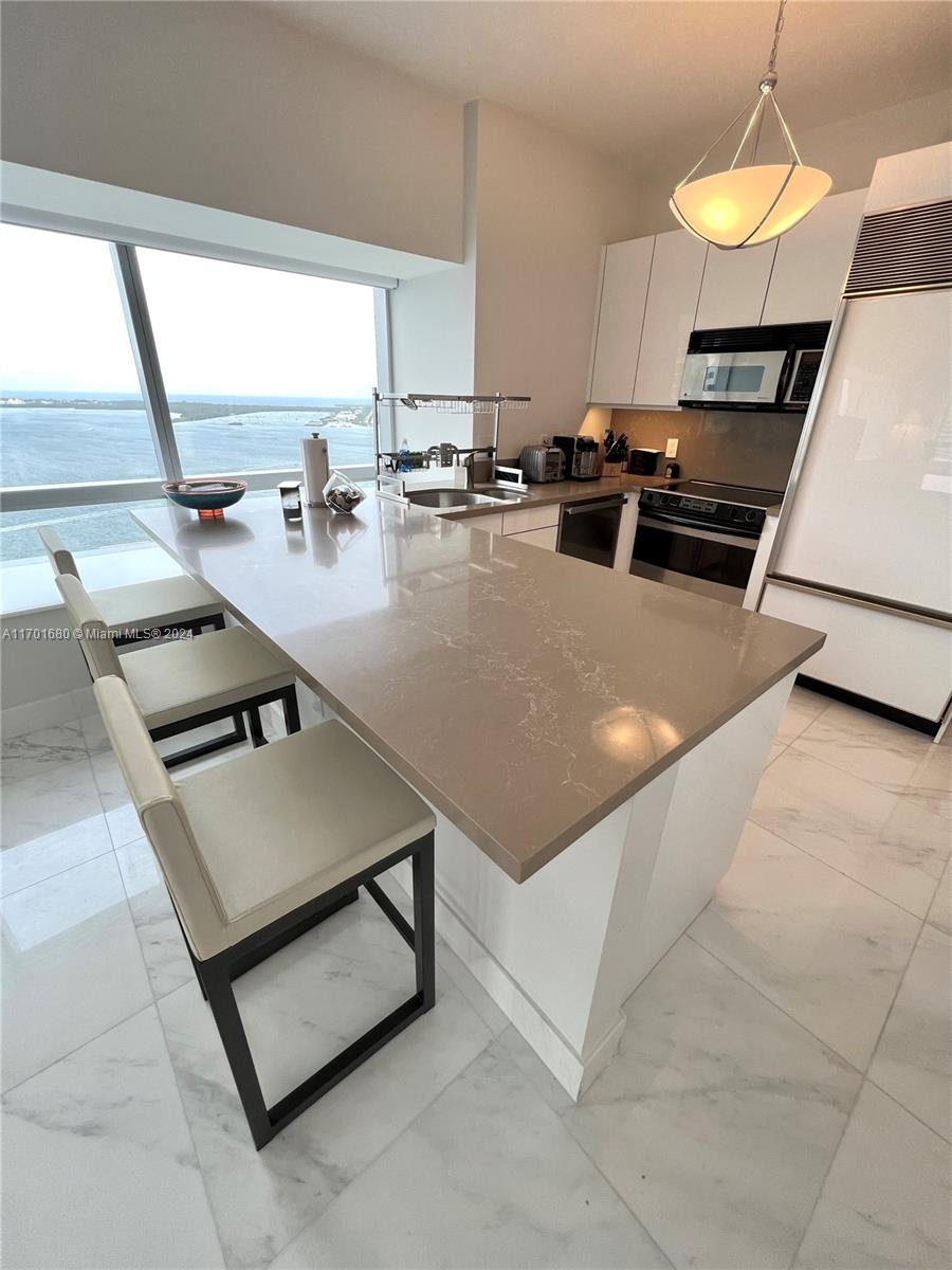 MILLENNIUM TOWER CONDOMIN - Residential