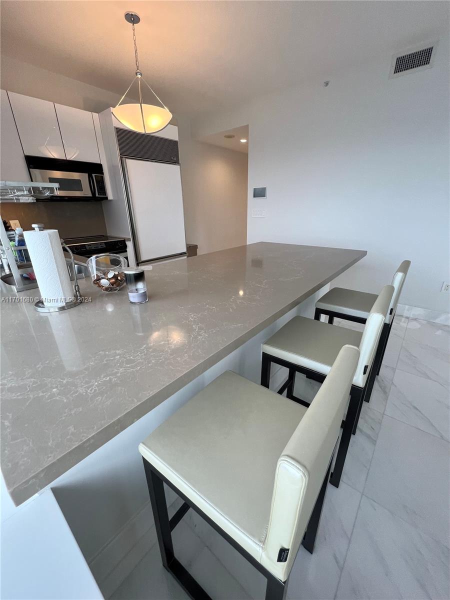 MILLENNIUM TOWER CONDOMIN - Residential