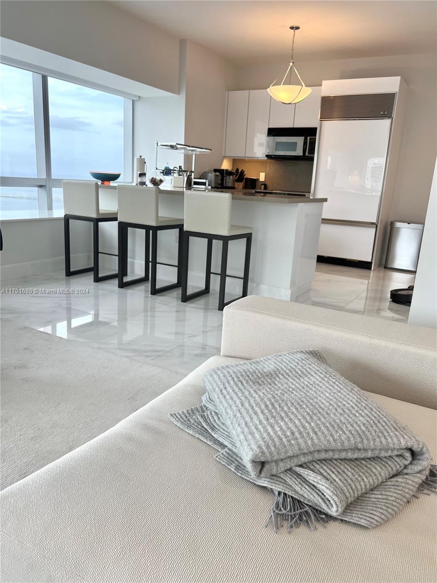 MILLENNIUM TOWER CONDOMIN - Residential