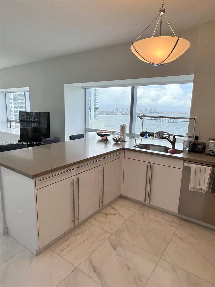 MILLENNIUM TOWER CONDOMIN - Residential