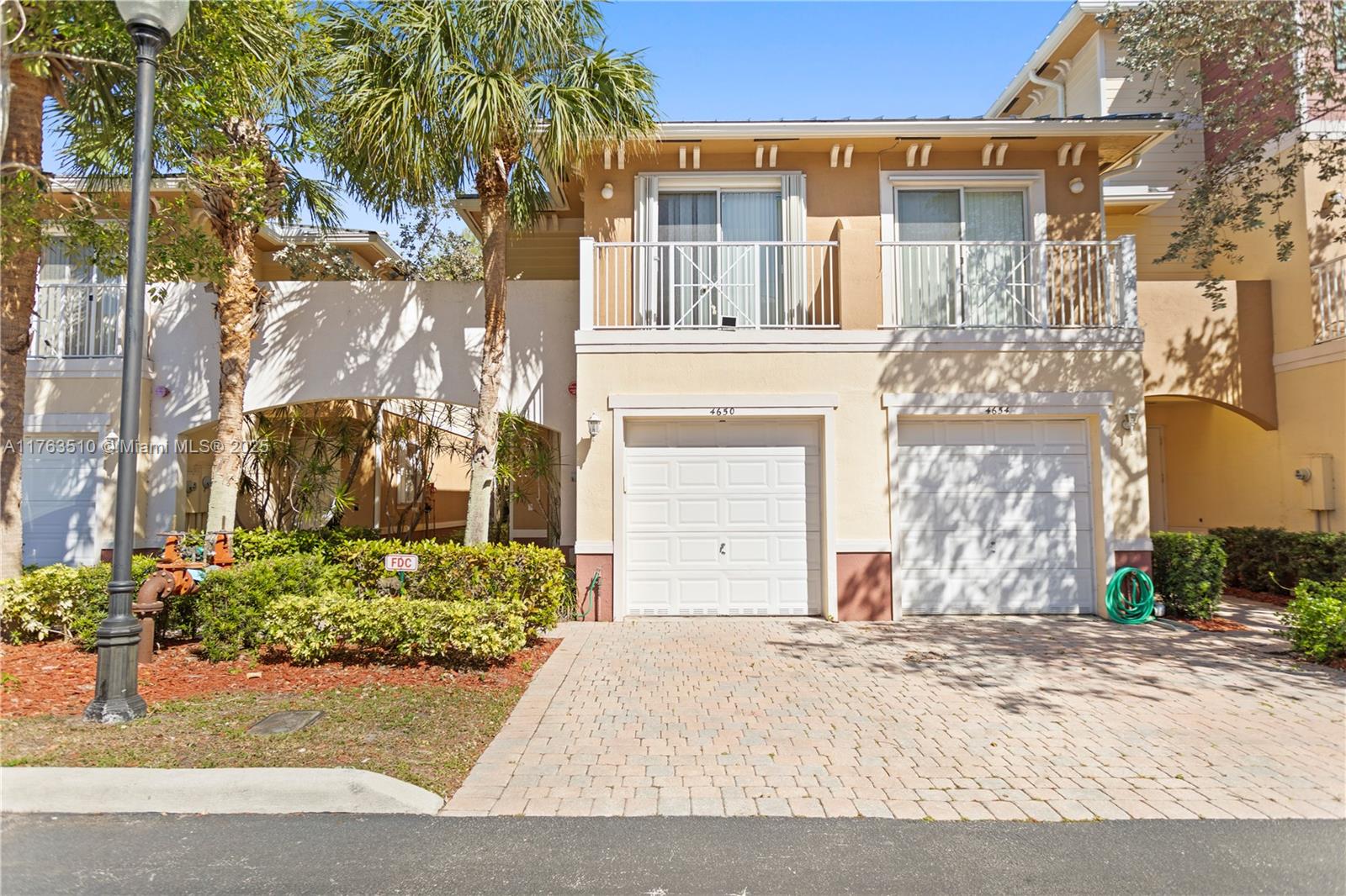 I'm excited to share details about this beautifully maintained 2 bedroom,2.5 bathroom corner unit townhome in the city of Davie. It is conveniently located minutes from Nova Southeastern University, the new HCA University Hospital, and the Hard Rock Guitar Hotel.

The home boasts a wonderful open floor plan, tile throughout the main level, granite countertops, and stainless- steel appliances. Additionally, the A/C, water heater, refrigerator, garbage disposal, and more have been replaced over the last few years, ensuring worry-free living.

Relaxation is key with two second-floor balconies and a serene green space off the back patio. The home also features a metal roof, hurricane shutters, Tesla Level 2 charger for electric vehicles, and much more.
