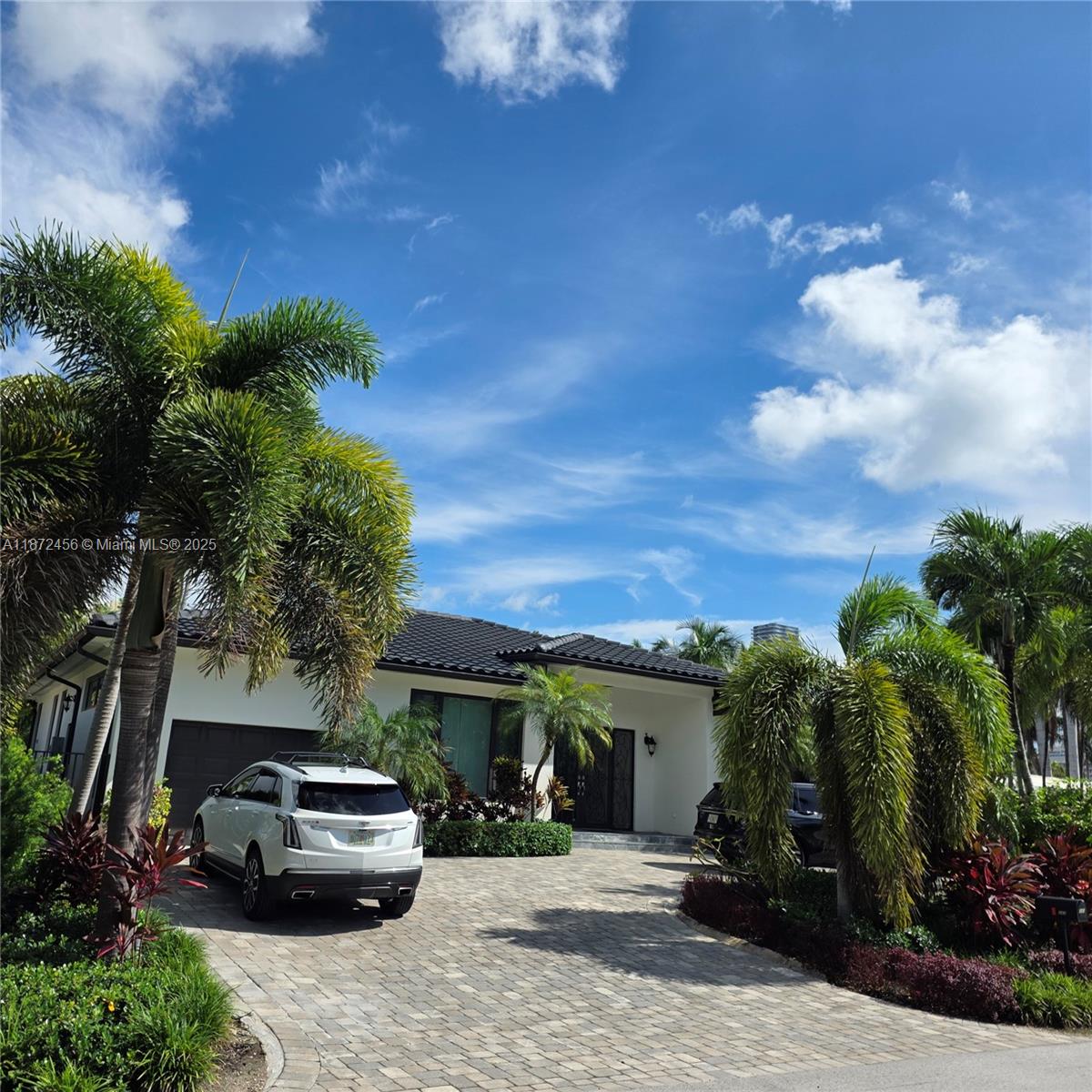 ***Stunning one-story custom-built residence, designed with exceptional attention to detail and completed to modern construction standards, with a Certificate of Occupancy issued in November 2018***
The interior showcases 12- and 10-foot high ceilings, travertine stone flooring throughout, and high-end appliances that enhance the home’s contemporary aesthetic***
Step outside to a beautifully crafted outdoor area featuring a heated/cooled, salt water pool and jacuzzi, all set on an elegant travertine stone deck*** The property includes impact-resistant windows and doors, and the primary suite offers two spacious walk-in closets***
Located in Sunny Isles Beach, one of Miami’s most desirable residential areas, this home is just a short walk from the ocean and close to parks, shops, and local amenities***
There are too many benefits to list in a single description—this home truly stands out***