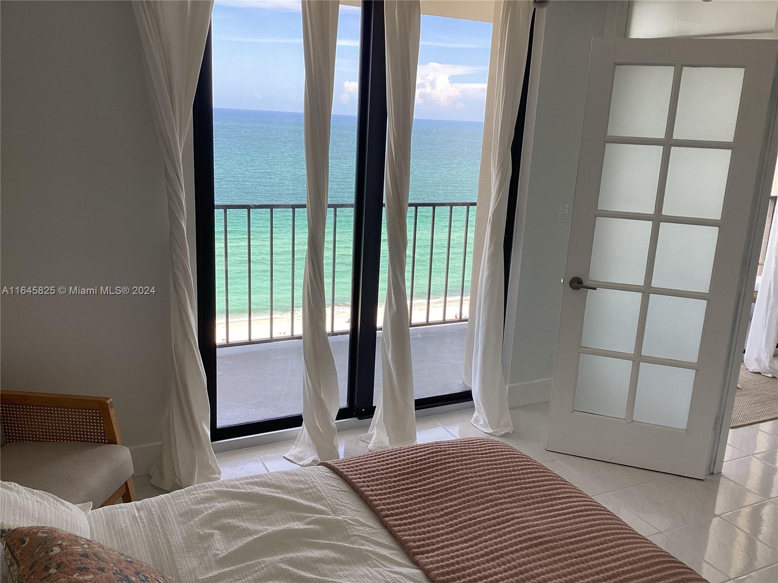 Penthouse unit with unobstructeed views of the ocean, beach, pool and breathtaking view of South Florida's dawn.  Featured den was turned into a full second bedroom with private full bath and closet. Furnished exquisitively, unit features large balcony, 2B/2b, new kitchen and open living dining room.  A NE corner unit located at Oceanfrot Plaza, this gem condo, offers soon-to-be remodelled new gym, fantastic pool area with fancy Clubhouse and Gazebo picnic area, billiard and pingpong rooms and a fabulous recreational room lounge with panoramic TV. WIFI access on most common areas.  Basic Cable and Internet Access included.  Modern laundry room per floor.  Security fobs, lobby attended by a guard at front desk. Assigned one parking per unit.