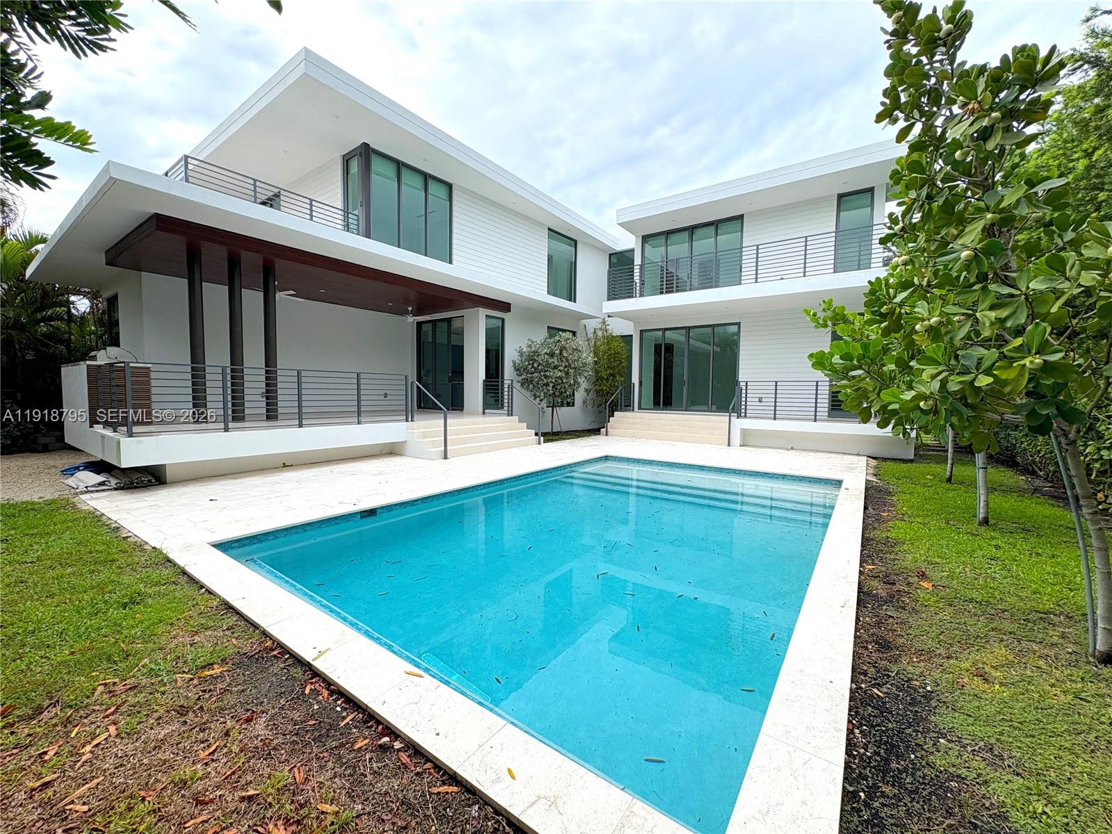 Stunning new-construction contemporary residence offering the perfect blend of modern design and luxurious comfort. This thoughtfully crafted home features 5 spacious bedrooms plus a private maid’s quarter, 4 full bathrooms, and an elegant powder room.
Designed with high-end living in mind, the home showcases luxury finishes throughout, including custom built-in closets and fully equipped black kitchens with premium appliances—ready for immediate move-in. The open-concept layout highlights sleek architectural lines, abundant natural light, and exceptional craftsmanship at every turn.
Step outside to your private summer kitchen with BBQ, perfect for entertaining and enjoying outdoor living year-round.
A turnkey opportunity for those seeking style, sophistication, and exceptional functionality in a prime location. This contemporary masterpiece is truly move-in ready.