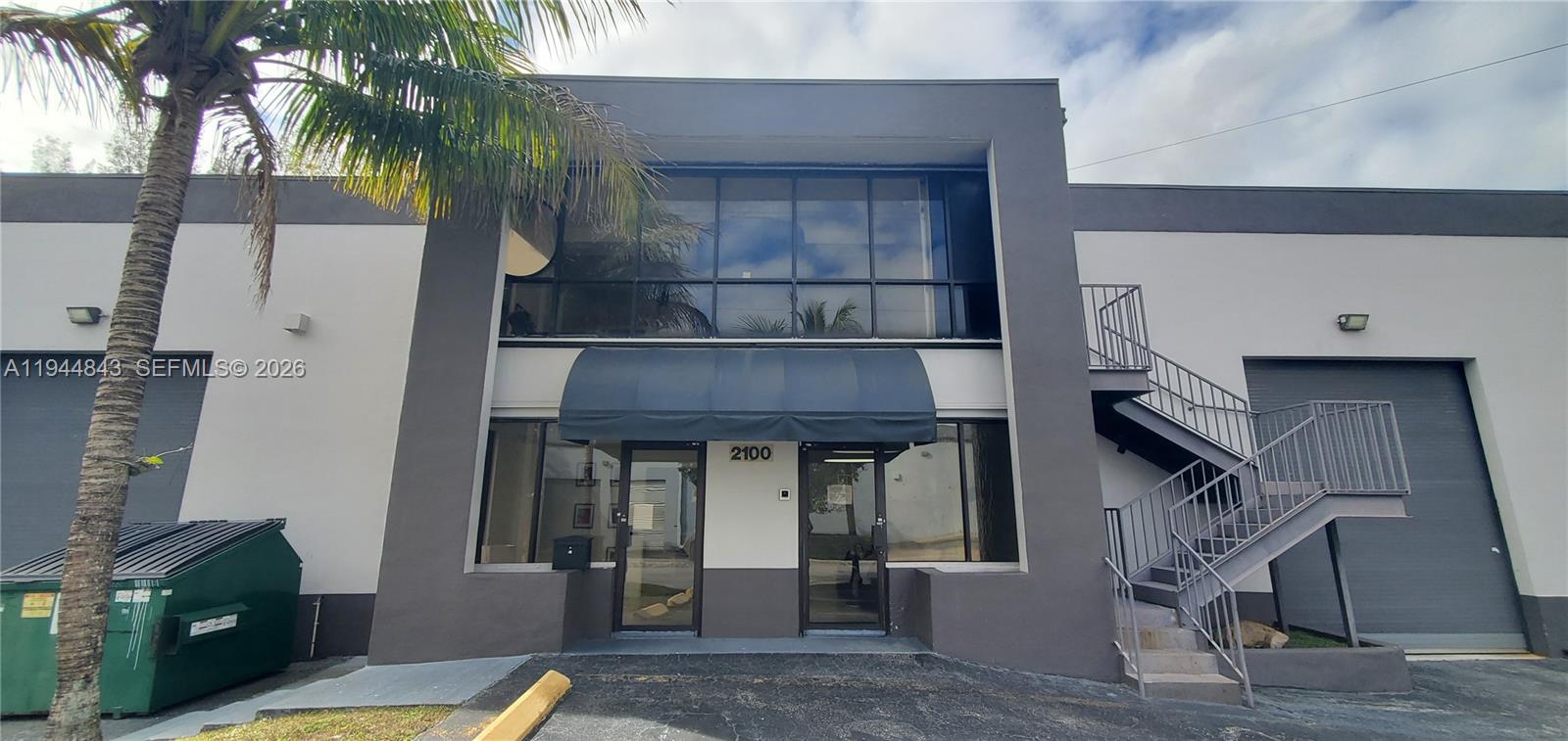 Freestanding 100% A/C warehouse in Fingerlakes area of Doral. One loading dockwell and one Ramp which can be converted back to dockwell. Two doors at the rear of the warehouse area added for ventilation. There are 8 private offices on two floors with porcelain flooring. Men's and women's bathroom, beautiful reception area, employee kitchenette, warehouse work office with A/C. Security system, '22 ft ceiling height, new roof recently coated with warranty, 11 parking positions, 3 phase power, new office A/C units, 100% HVAC in the Warehouse!  This property is turnkey and a must see.