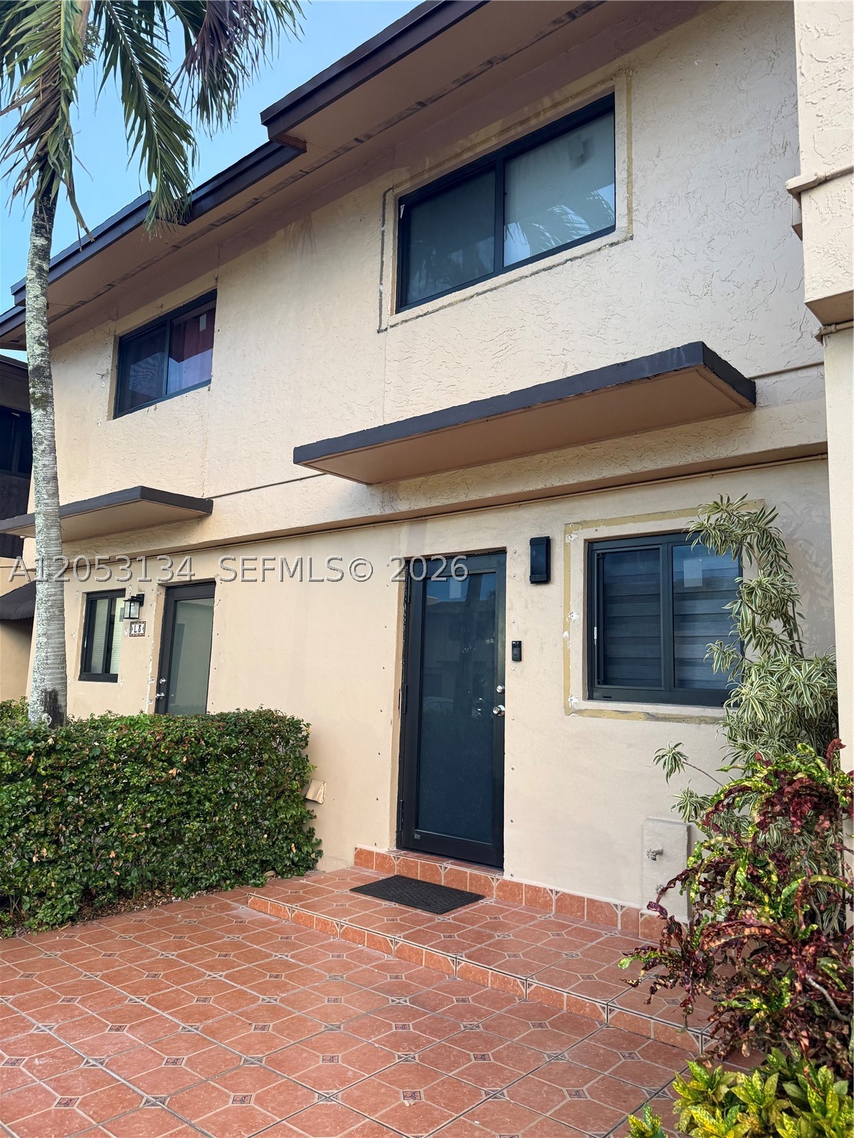 BEAUTIFUL 2 BEDROOM 1 BATH AND 1/2 BATH IN THE GREAT LOCATION OF SWEETWATER , 1 PARKING SPACE IN FRONT OF THE UNIT , HUGE CONCRETE PATIO, IMPACT WINDOWS AND DOORS.