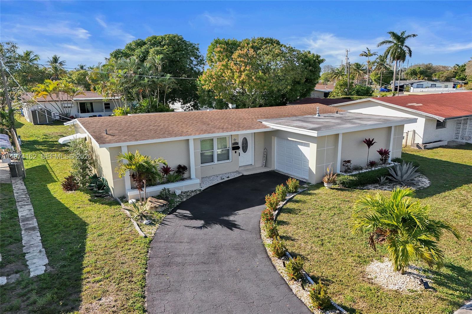 South Florida living at it’s finest, in the heart of Sunrise! This well-maintained home features a comfortable split floor plan with 2 bedrooms + 2 bathrooms, spacious living room, flexible Florida room and attached 1 car garage for additional storage. Nicely appointed kitchen with granite counters, plenty of cabinet space and natural gas stove! Spacious backyard has plenty of room for entertaining, a cozy patio for morning coffee and even space for a future pool. Property is turn key with new roof in 2021, natural gas water heater and newer HVAC. Centrally located in a friendly neighborhood with easy access to highways and shopping. Property presents an excellent value as it's priced to sell - schedule a showing today!