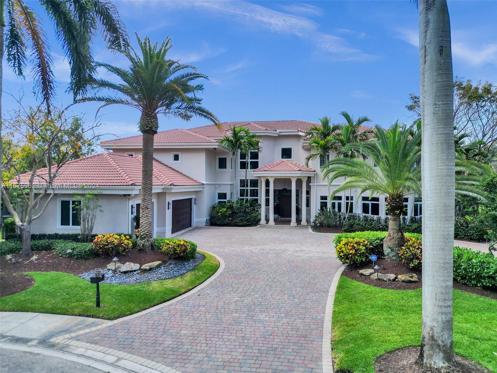 ONE-OF-A KIND newer built home in the prestigious section of Riviera in Weston Hills Country Club! Placed perfectly on a cul-de-sac lot & surrounded by water, this Stunning home boasts 6 bedrooms, 6 1/2 baths, PLUS an expansive office, home gym, media room, playroom & mud room with a vast amount of storage! Featuring unparalleled finishes & custom designer details through-out, living room with floor to ceiling windows, completely remodeled kitchen with top of the line appliances & a custom walk-in pantry, Primary suite with balcony, large closets & luxurious bath. The outdoor paradise offers an oversized pool with spa, built-in BBQ, &  Tiki Hut with a private backyard. In addition, laundry room with double washer & dryers, 3 car garage with A/C, hurricane impact windows & a newer roof!