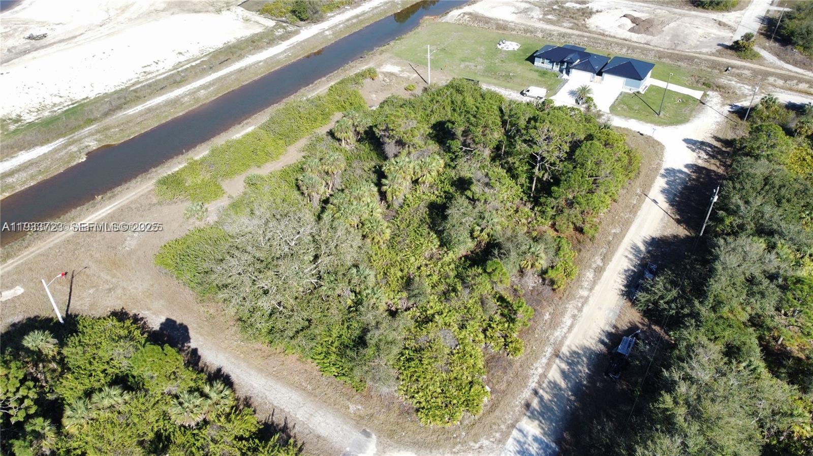 Amazing 1/4 lot in Lehigh Acres, Florida, is situated just west of Sunshine Blvd, making commuting in and out of your new dream home super convenient. Highly desirable lot in a very popular area of Lehigh Acres, NO HOA, NO CDD, many new development is going up in the area. The area boasts lots of new homes, yet remains quiet and peaceful, offering the best of both worlds. Make an Offer today to Own this Land as your Dream Home Site or as a Savvy Investment.