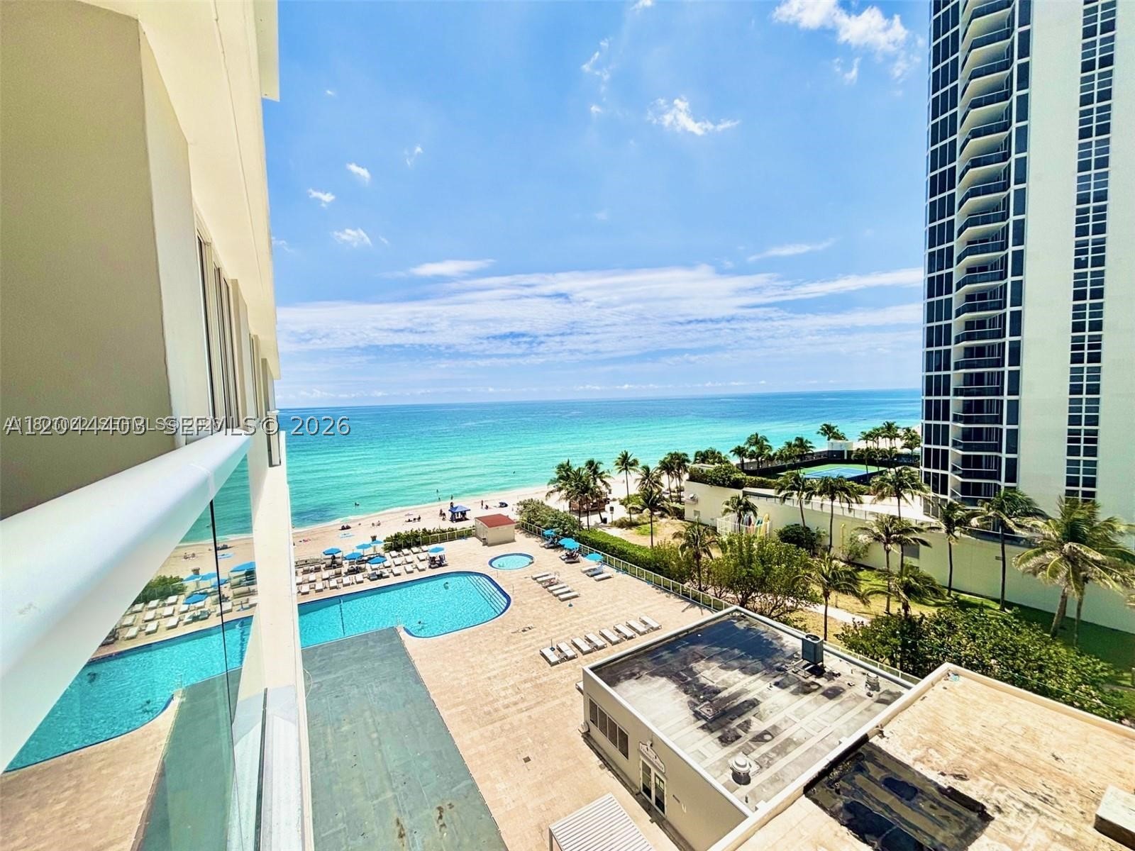 BARGAIN! Discover Paradise in Prestigious Sunny Isles! CONDO HOTEL! This is the lowest-priced unit with a GLASS BALCONY & OCEAN VIEW in the building—directly on the BEACH with ideal SOUTHEAST-facing ocean vistas. Enjoy OCEAN, CITY & INTRACOASTAL views! The building has recently been renovated, & the HOA fee covers all utilities; electricity, water, cable TV, & Wi-Fi. Outstanding amenities include a fitness center, large pool, hot tub, restaurants, poolside bar, hair salon, social event room, & 24/7 security. Located in a vibrant community just steps from Publix, a beautiful park across the street, banks, restaurants, cafés, & public transit. Short-term rentals & Airbnb are permitted.