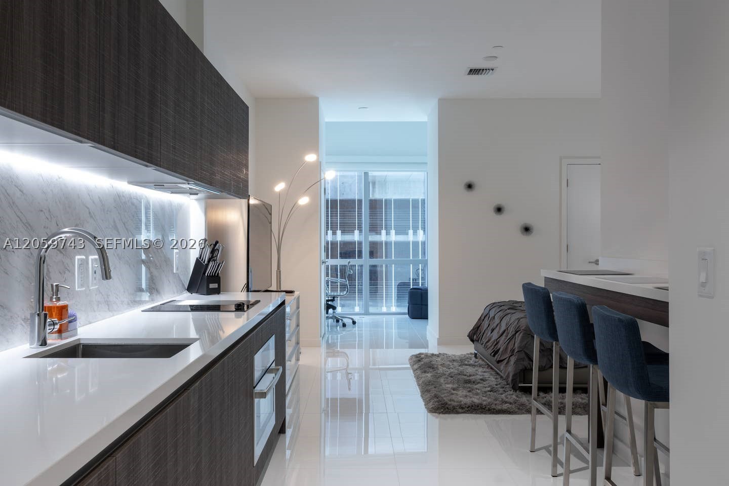 Experience resort style living in one of Miami's most amenity-rich buildings so complete, you'll rarely need to leave. Enjoy five resort-style pools, a state of the art fitness center, yoga studio, spa, jacuzzis, tennis and basketball courts, entertainment lounges, a recording studio, relaxation areas, BBQ Area, and breathtaking views from every angle. Located in the heart of the rapidly growing Miami Worldcenter, one of the city's most exciting new neighborhoods, you'll have world-class shopping directly downstairs and be just steps from restaurants, the Kaseya Center, museums, Bayside, and much more.
Whether you're looking for a primary residence, an investment property, or the flexibility to enjoy both, this unit allows short-term rentals up to 12 times per year. Live in it full-time, rent it out, or enjoy it for part of the year while generating income the rest of the time.
Offered fully furnished and move-in ready, this residence features numerous upgrades, including impressive 10-foot ceilings, electronic window shades, and elegant marble-finished bathrooms that add a sophisticated, luxury touch. A beautifully designed layout makes the home feel even more spacious, creating the perfect blend of comfort, style, and investment potential.