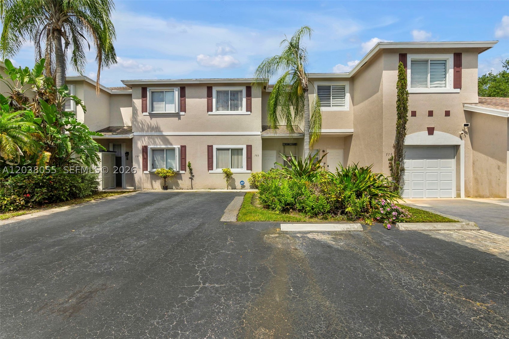 Spacious 2-bedroom, 2.5-bath townhome with 3 assigned parking spaces, located in a well-maintained community. This home features a completely remodeled kitchen with granite countertops, stainless steel appliances, and a pantry for added storage. The layout offers all bedrooms upstairs, including a generous primary suite with a walk-in closet and ensuite bath with shower, plus a junior suite for added comfort. Upstairs also includes a convenient laundry room. Flooring includes carpet upstairs and a combination of laminate wood and tile downstairs. Additional highlights include an A/C approximately 5 years old, water heater and extra storage downstairs, and impact shutters on all windows. The roof is less than 10 years old. HOA is $405/month and covers exterior maintenance, roof, and exterior paint. Community amenities include a pool and ample guest parking both in the front and rear.