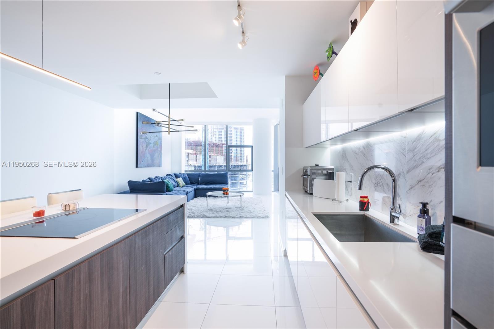 Located within Miami Worldcenter, the second largest master planned community in the U.S., PARAMOUNT Miami Worldcenter, the building with the most amenities in the world. This 2,204 sq ft. 3BD + Den has been converted to 4 bedroom unit! AVAILABLE NOW, and AVAILABLE furnished upon request is a must see!! Access to 46 different amenities such as 5 pools, spa, outdoor
lounge, summer kitchen, game room, state of the art fitness center, boxing studio, basketball court, racquetball, yoga, observatory, jam room and recording studio and much more. Just steps from the Brightline Train Station, Port of MIA, Arena and minutes to MIA Airport, Wynwood, Miami Beach, nightlife, restaurants, Apple Store and so much more.