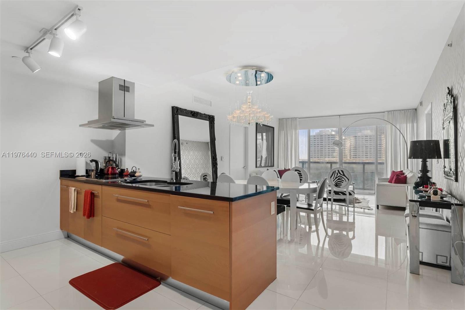 Experience luxury living in this beautifully decorated and fully furnished 2-bedroom, 2-bathroom residence plus a spacious den, offering breathtaking views of the bay and skyline from the highly sought-after line at Icon Brickell Tower 2. Filled with abundant natural light, this thoughtfully designed layout provides both comfort and flexibility. The den functions perfectly as a home office, TV lounge, or additional sleeping area, making it ideal for modern living. Featuring contemporary, high-end furnishings throughout, this residence creates a serene and sophisticated atmosphere. Located in the heart of Brickell, just moments from Brickell City Centre and Mary Brickell Village, you’ll enjoy premier shopping, dining, and entertainment at your doorstep. Icon Brickell offers world-class amenities, including the renowned Cipriani restaurant, a full-service spa, state-of-the-art fitness center, infinity pool overlooking the bay and Brickell Key, movie theater, sauna and steam rooms, game room, dog park, and 24-hour concierge services. This fully furnished unit includes 1 assigned parking space, basic cable, internet, and water — all included in the HOA.