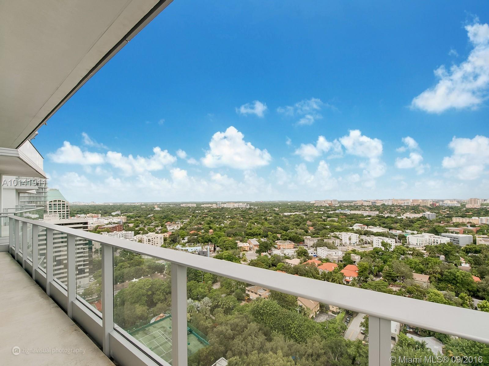 Endless bay and city views from this spectacular corner unit at Grovenor House. Amazing split floor plan with oversized spaces. Formal living and dining with breathtaking bay and marina views. Beautiful Italian kitchen with breakfast area that opens to family room featuring spectacular city & downtown views. Master plus three additional bedrooms, each with their private bath.  Building amenities include infinity pool with cabanas, spa, tennis, gym, library, billiard room.Walking distance to Coconut Grove