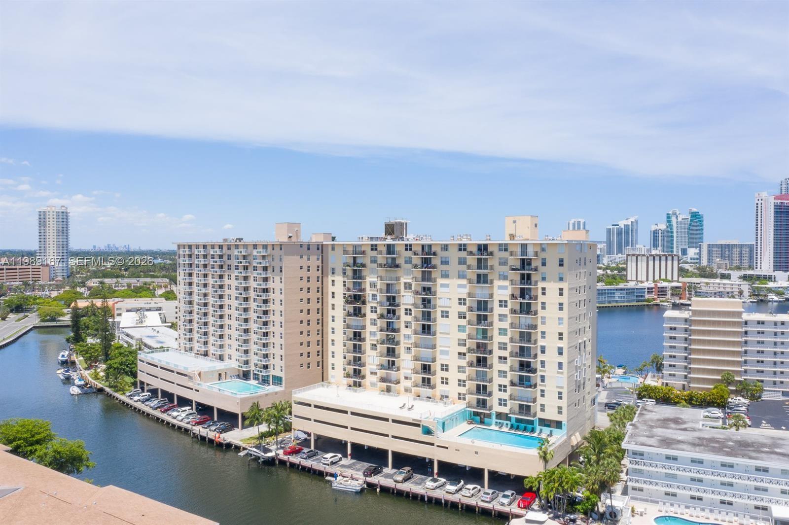 Best Priced 2/2 Condo in Hallandale Beach – Handyman Special! Priced to sell quickly, this unit offers an excellent opportunity to renovate and create your ideal space. Features include impact windows and doors, ample closet space, one assigned parking space plus guest parking, and an additional storage unit. A 2026 new hot water heater and electrical panel (with permits) are already in place. Washer/dryer on every other floor and on-site exercise room add convenience.

Enjoy resort-style living with a waterfront pool overlooking the Intracoastal (currently being upgraded), scenic water views, and a prime location within walking distance to Hallandale Beach, shopping, and dining. Boat dock available for $300/month with immediate slip up to 24 feet. Service animals permitted.

Located in Golden Horn South, a 54-year recertified building with major upgrades including roof, plumbing, balconies, electrical, pool area and seawall. Community amenities include pool, picnic area, clubhouse, and clubroom. HOA fees may decrease after 40/50-year recertification (mid-2026), offering strong upside potential. No cable or internet included.

Special assessment balance is $37,959. Seller will pay in full at closing!!! 
Minimum 700 credit score required. Fiber internet coming Dec 2026: 2 Gbps symmetrical speeds with whole-home mesh Wi-Fi coverage.