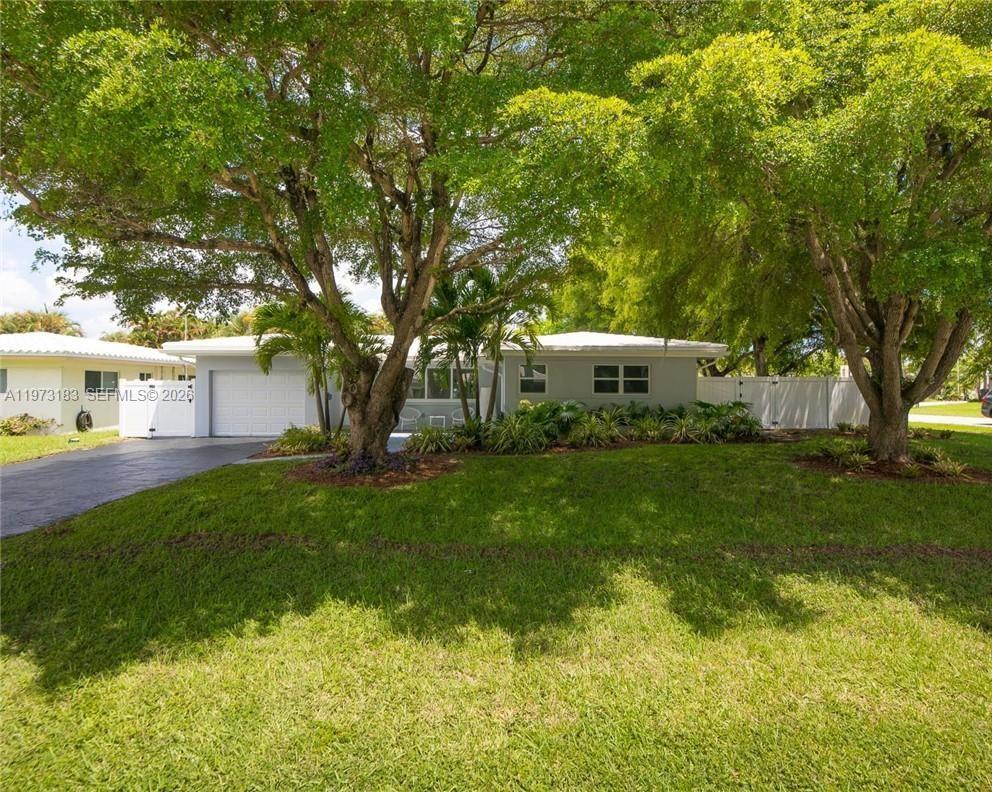 Beautifully maintained single-family home featuring a private fenced yard and inviting pool area - perfect for relaxing or entertaining. This property offers 3 bedrooms and 2 full bathrooms, a 1-car garage, and an extended driveway that accommodates up to 3 additional vehicles. The spacious kitchen is equipped with stainless steel appliances and opens comfortably into the main living areas. A split-bedroom layout provides added privacy and functionality, ideal for families or guests. ENJOY ADDED PEACE OF MIND WITH A NEW ROOF CURRENTLY UNDERWAY AND SCHEDULED FOR COMPLETION PRIOR TO CLOSING.

Excellent income-producing opportunity — currently rented and generating strong rental income.

Conveniently located with easy access to major highways, close to highly rated public schools, and just minutes from the beach.