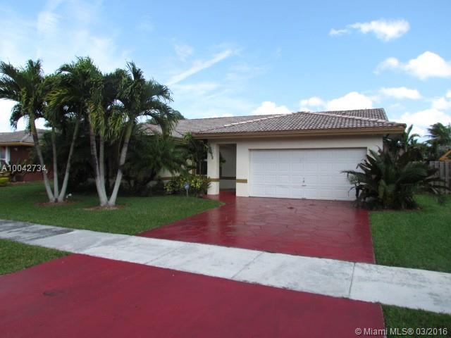 Magnificent 4 bedrooms, 2 baths single family pool home just south of Country Walk. Nice floor plan with vaulted ceilings. Remodeled kitchen with granite counter tops. Tile and laminate flooring for easy maintenance. Covered terrace leads to inviting pool. A nicely cared home in a family oriented neighborhood. Easy to show - great value.