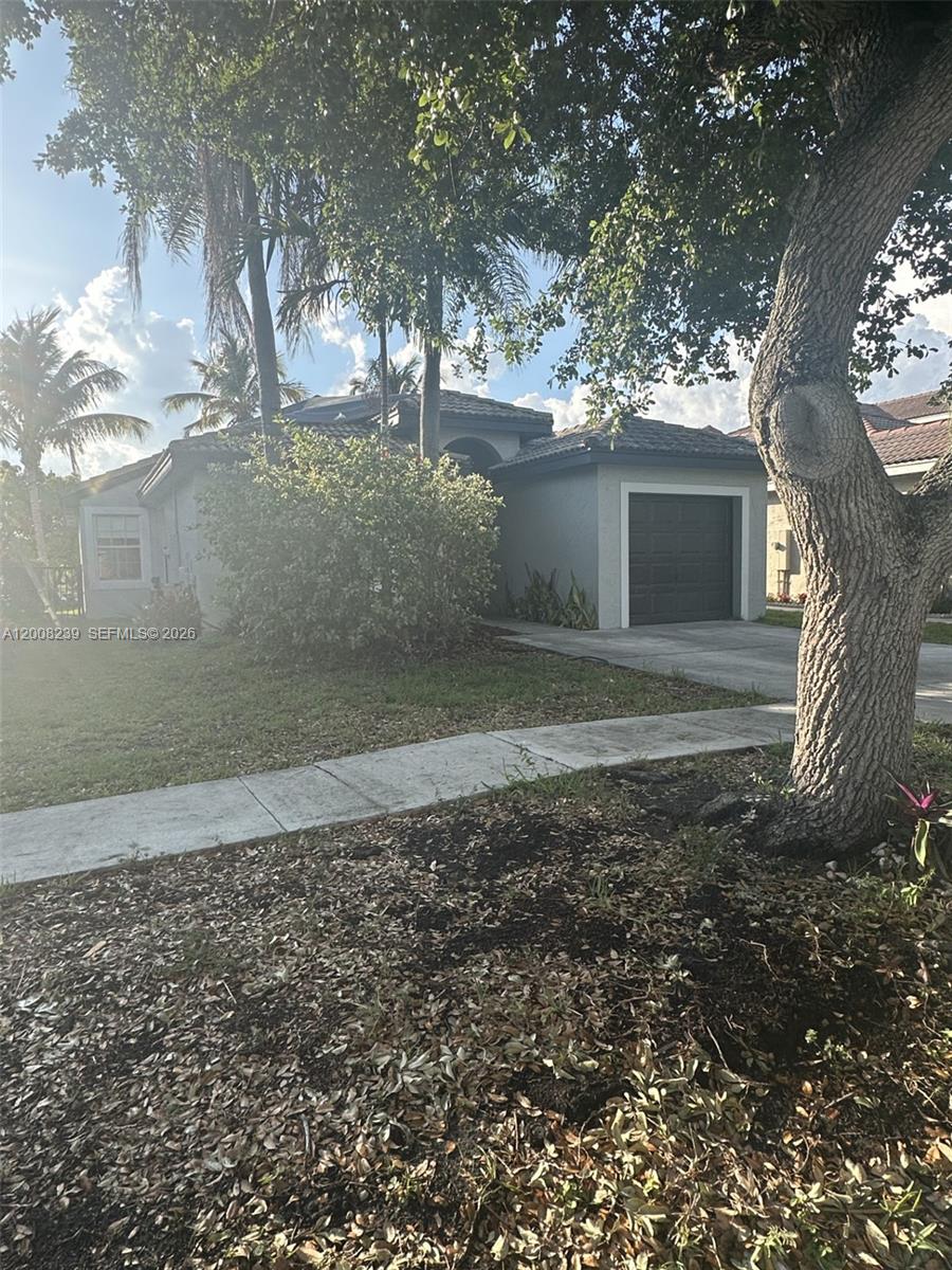 Canal front home in gated community at desirable Silver Lakes in West Miramar. This charming home features 3 bedrooms and two upgraded bathrooms. Stainless steel appliances, all laminated beautiful floors. Enjoy a beautiful canal view for entertaining or for the calmness of it all. Very short walking distance to the community pool. Close to many highways.