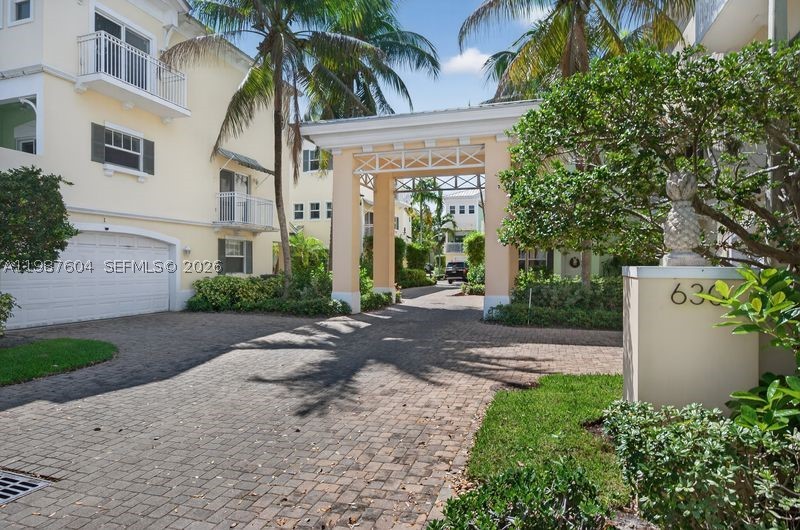 Move-in ready 3/3.5 tri-level townhome in prime Fort Lauderdale location, minutes from downtown, Las Olas, beaches, shopping, dining, airport, I-95 and I-595. Bright and spacious with crown molding, updated flooring and NO CARPET. First-level bedroom with full bath is perfect for in-laws, teens, guest or a private office.  Each bedroom has its own bathroom.  Features include a 2-car garage with 4 total parking spaces, large kitchen with stainless steel appliances, wood cabinetry, granite countertops and breakfast bar, plus a spacious balcony for outdoor dining.  Spacious primary suite offers a walk-in closet, private balcony, Roman tub, and separate shower. Walking distance to A+++ elementary school.  HOA includes exterior insurance, property & building maintenance.