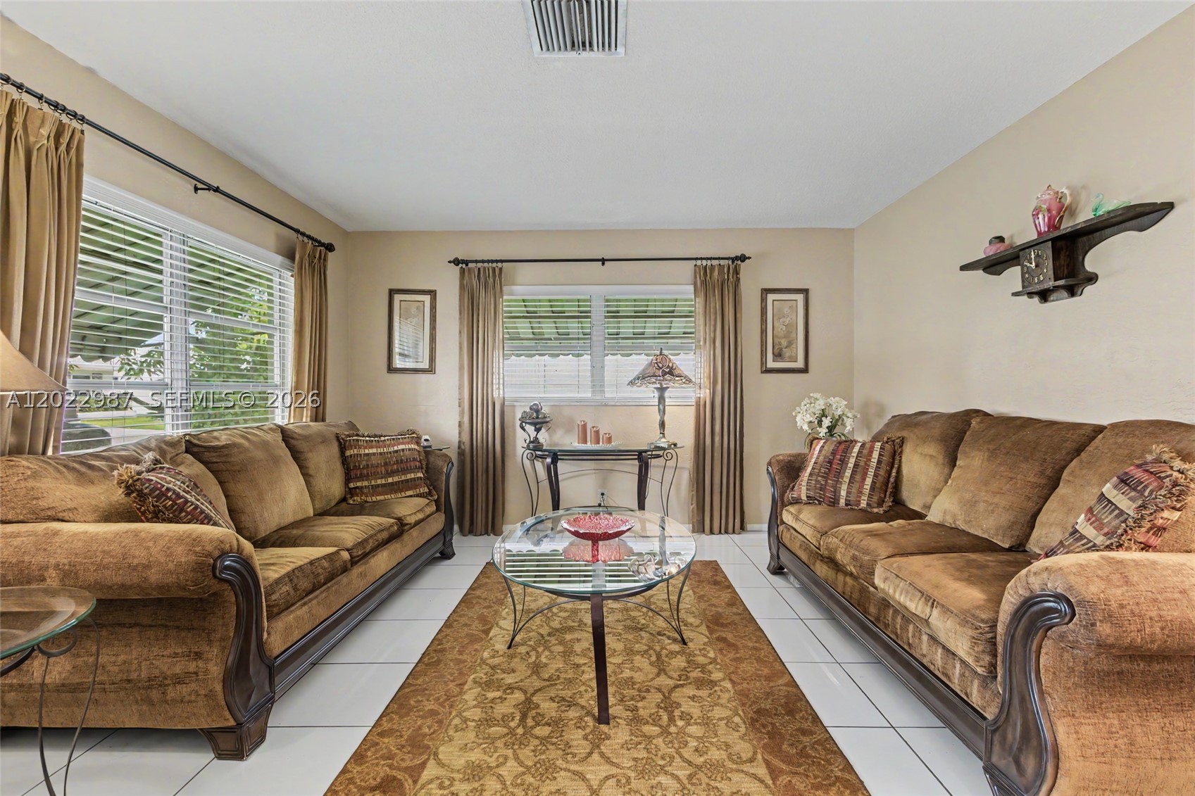 Wake up every morning to peaceful water views in this beautifully maintained home located in the desirable Sunset Isles section of The Mainlands, a vibrant 55+ community in Tamarac. Enjoy coffee on your screened patio overlooking the canal while taking advantage of a low-maintenance lifestyle close to shopping, dining, and major highways. This spacious 2-bedroom home features tile flooring throughout, a bright and cheerful interior, a newer roof (2020), and A/C (2022), giving buyers peace of mind on two of the home's biggest expenses.
The community welcomes pets and motorcycles and offers resort-style amenities including a clubhouse and pool, all within walking distance. Lawn care, sprinkler maintenance, exterior painting, and roof cleaning are included in your monthly low-maintenance fee, making it easy to spend less time maintaining and more time enjoying South Florida living. Also, I'm a lender, and if you're wondering what the payments would be, I can help you with that, too. Motorcycles are allowed and no restrictions on pets.