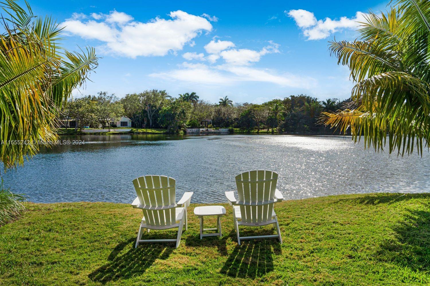 Welcome to this rare lakefront property that sits on an acre plus of land surrounded by mature oaks. The property has an advantageous north-south orientation and is a bird lover's paradise. Nestled in the Banyan Drive Gated Community, it is conveniently located near the best schools. Enjoy tranquil waterfront living in the existing home or build your dream house on an oversized waterfront lot. Give us a call and come see yourself.