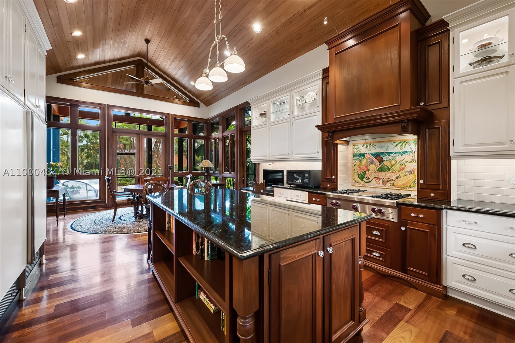 Sensational 10-acre+/- estate in the Redland is filled with local and exotic flowering trees and plants. Artistic entry gates welcome all and foretell the enchantment that awaits as you follow the road past two sizable koi ponds up to the main house. Designed by Charles Harrison Pawley the main house offers coffered and vaulted ceilings, Brazilian cherry floors and large living areas including the office/family room and a wonderful kitchen with top-of-the-line Wolfe and Sub-Zero appliances. Take the stairs or the elevator up to the master suite offering his/her closets, luxurious master bath and a screened-in porch overlooking the pool and waterfall. Additional features include a detached 1b/1b Guest Cottage, entertainment pavilion, another 3b/2b staff house, and 80KW full house generator.