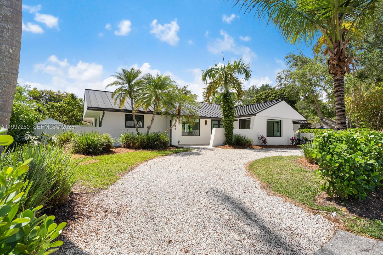 Nestled at the end of a tranquil cul-de-sac in the sought-after Palmetto Bay community, this fully renovated 4-bedroom, 2-bathroom residence offers the perfect blend of privacy and contemporary style.  Be the first to experience a home transformed by meticulous upgrades, including elegant porcelain tiling, custom millwork, new interior doors, and window treatments throughout.  The chef-inspired kitchen features a suite of brand-new appliances, while the home's mechanical integrity is ensured with a serviced septic system and professionally cleaned AC units and ducts.  Complete with a durable metal roof and full impact windows and doors, a large lanai overlooking the pool makes this turnkey property the ultimate retreat for the modern family.