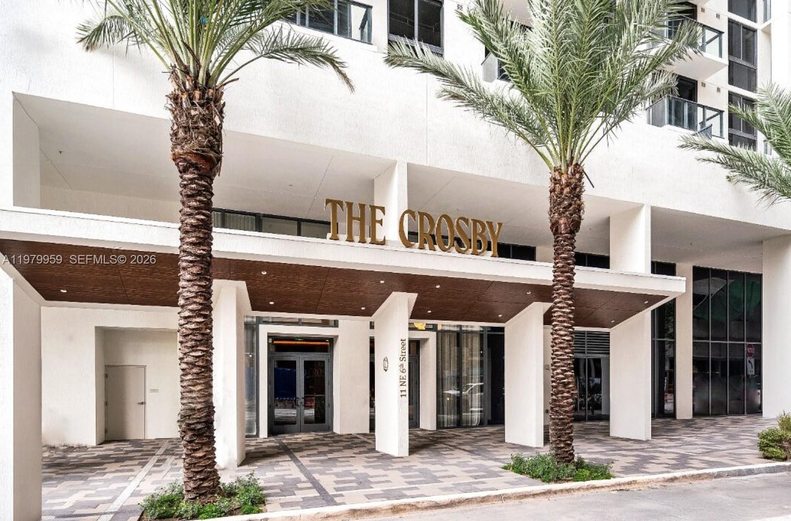 Experience elevated city living in this turnkey, fully furnished 1-bedroom, 1-bath residence at The Crosby Miami Worldcenter in the heart of Downtown Miami. This stylish unit features floor-to-ceiling windows, a private balcony, and a bright open layout. The designer kitchen showcases custom Italian cabinetry and integrated Bosch appliances, while the spa-inspired bathroom offers a rain shower and elegant finishes curated by AvroKO. Smart-home features and a full-size washer and dryer add modern convenience. The Crosby permits short-term rentals with no restrictions, offering exceptional flexibility for owners and investors. Residents enjoy over 22,000 SF of resort-style amenities including a rooftop pool and jacuzzi, private restaurant and bar, fitness center, coworking spaces, skyline lounge, and 24/7 concierge, all steps from Miami’s top dining, shopping, and entertainment.