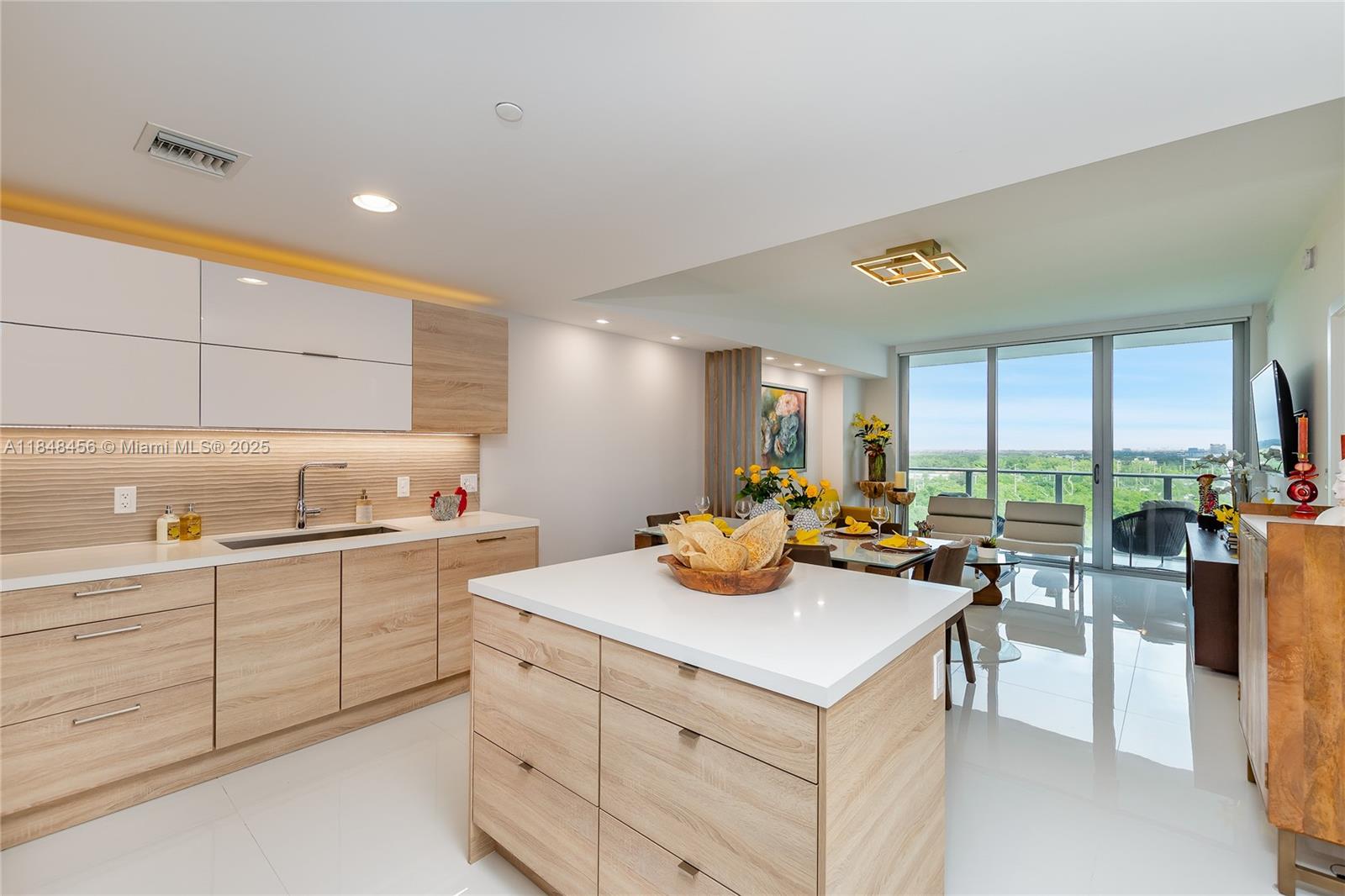 2 ASSIGNED PARKING SPACES (side-by-side, not tandem). Beautifully finished condo with views of the Intracoastal & Sunny Isles. Every detail has been taken care of: Kitchen cabinets converted to drawers instead of impractical shelves. Same porcelain tile floor throughout the unit, including bathrooms. Roller shades in bedrooms & living room, blackouts in bedrooms (electric in Master Bedroom). Custom closet cabinetry. The Harbour is one of the newest buildings in the area, nestled between 2 parks, lush vegetation & the Intracoastal. Resort-style amenities: heated pool, spa with sauna, steam room, treatment rooms, state-of-the-art gym, racquetball, kids’ playroom, BBQ area, tennis, basketball, soccer, car wash, pet spa, and convenience store. Pictures have additional info. Tenant occupied until December 7, 2026