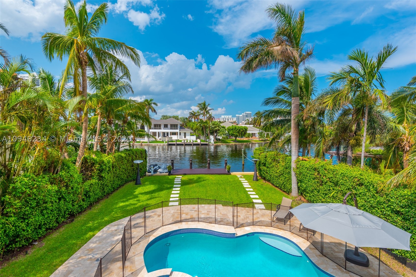 This turnkey Golden Beach chateau is primely located on the beautifully lush North Parkway, offering open water views and a deep backyard perfect for waterfront living. The home has been fully upgraded, boats 5 bedrooms, 5 bathrooms, 4,356 sq ft and the perfect balance of modern touches and warm finishes.