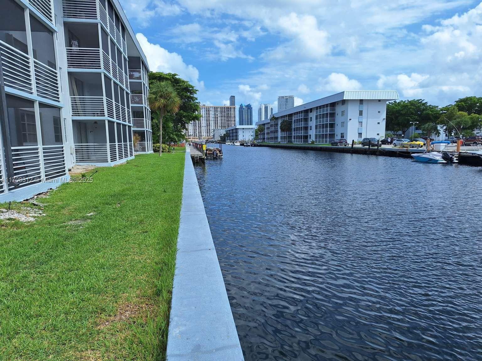 PRICE IMPROVED! Fantastic opportunity! TOP Floor 1/1.5 condo offering beautiful canal view, newly renovated balconies & screened porch facing south perfect for enjoying meals at any time. Ideally located close to the Intracoastal Mall, beaches, retail centers, restaurants & houses of worship. Eden Isles community amenities include a clubhouse, heated pool, new gym, sauna, library, private storage, & laundry room. Maintenance covers structural insurance, water, cable, garbage, pest control, private dock available for rent. HOPA community, 12+ children welcome.  The marina is a great addition for those who love boating. The new owner benefits are new roof, renovated parking lot, new seawall & building newly painted. No assessments, the building already Pass the 50 yr Re-certification. Unit on a lease until April 15, 2027.