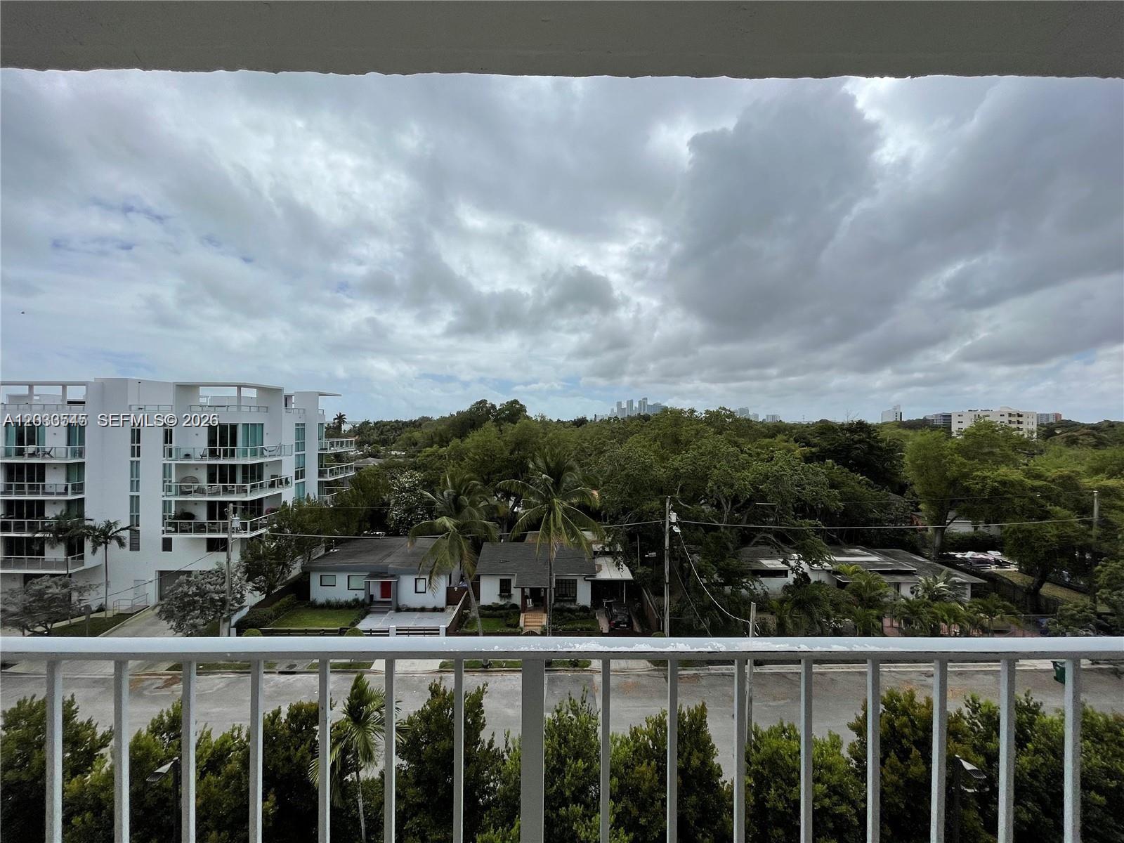 Bright and spacious studio in the sought-after Nirvana Condominium, located in Miami’s vibrant Upper East Side. Perched on the 6th floor, this unit features a private south-facing balcony with sweeping treetop and skyline views. The gated, bayfront community offers resort-style amenities, including two pools, a fitness center, beach volleyball court, kayak launch, lush tropical grounds, and an on-site café. Ideally situated just minutes from the Design District, Wynwood, Midtown, and some of Miami’s best dining and entertainment. Currently leased at $1,900 per month, making it an excellent opportunity for investors or future owner-occupants. Special assessment: $76.63/month.