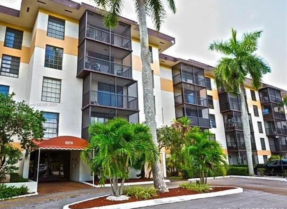 Beautifully updated unit featuring a bright living-dining area, an upgraded kitchen with stainless steel appliances, and a large bedroom with a walk-in closet. Enjoy tile and wood flooring throughout, and a stylish bathroom with a walk-in shower and elegant finishes. The unit also includes an in-unit washer and dryer for your convenience. Relax on your private balcony with roll-down shutters. Additional highlights include central A/C (2 years old), electric water heater, and extra storage on the same floor. Assigned parking included. Located in a gated community with 24-hour screened security and great amenities—swimming pool, tennis courts, and gym. **Unit is currently rented for $1,500/month until January 31, 2027**, offering excellent investment potential.