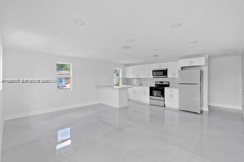INCENTIVES FOR CLOSING COST Beautifully and completely remodeled corner property featuring 3 bedrooms and 2 bathrooms. This home offers brand new roof, new plumbing and electrical systems, and impact-resistant windows and doors throughout. Located on a spacious corner lot with no HOA, providing flexibility and convenience. Property is in excellent condition and move-in ready. Easy to show!