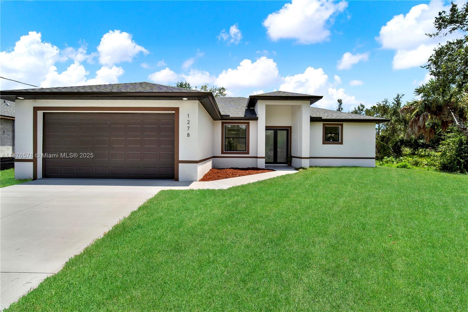 Fantastic custom made home with no expenses spared! From the moment you walk in, you'll notice the upgrades that set it apart from the typical builds nearby. High impact windows & doors provide peace of mind, while a full irrigation system keeps your lawn looking great year-round. Inside, open floor plan shines with upgraded cabinetry, stylish finishes, and thoughtful details that add comfort and value. The primary suite offers a spacious retreat with a spa-inspired bath, and the split layout ensures privacy for guests. Every detail has been designed with both everyday living and seasonal enjoyment in mind — perfect for full-time residents or seasonal looking for a low-maintenance Florida home No Association, No CDD!  Centennial park is just minutes away. House right next door for sale.  Seller is offering the buyer $5,000.00 for the buyer's closing costs.