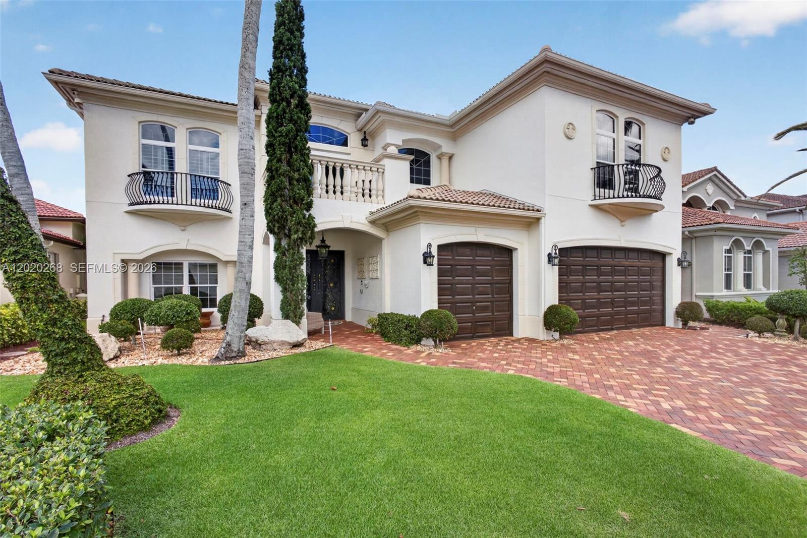Located in the prestigious gated community of Frenchman’s Reserve, this exceptional lakefront estate offers luxury living at its finest. Situated on an oversized lot with sweeping water views, this meticulously maintained residence features 4 bedrooms, 6 baths, and over 5,500 square feet of elegant living space designed for both entertaining and everyday comfort.A dramatic entry welcomes you with soaring ceilings, marble flooring, abundant natural light, and refined architectural details throughout. The chef’s kitchen features premium cabinetry, granite countertops, high-end appliances, a center island, and breakfast area overlooking the resort-style pool and lake.The spacious primary suite offers a private retreat with sitting area, custom walk-in closets, and a spa-inspired bath. Additional guest suites provide comfort and privacy for family and visitors. Formal living and dining rooms, a handsome office, and an inviting family room complete the thoughtfully designed floor plan. Step outside to your tropical oasis featuring a sparkling pool and spa, covered loggia, summer kitchen, and multiple seating areas positioned to capture stunning sunset views over the lake.
Frenchman’s Reserve offers championship golf, tennis, fitness center, clubhouse, spa, dining, and an ideal Palm Beach Gardens location close to shopping, fine dining, beaches, and Palm Beach International Airport.