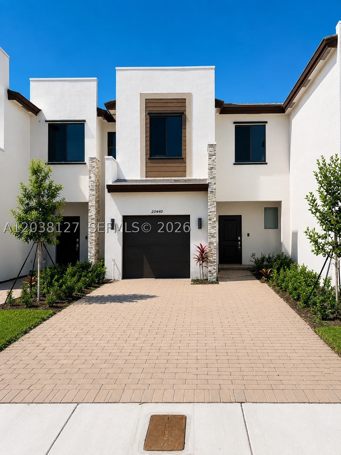 PRICED TO SELL! Beautiful , 3 bedroom 2.5 bath townhouse offering 1,618 SF of comfortable living space and a 1 car garage and parking for two additional vehicles in the driveway. This move in ready home features elegant marble countertops , stainless steel appliances and a functional open concept layout perfect for modern living . Located in a secure gated community with resort style ammenities including sparkling pool, fully equipped fitness center, clubhouse and outdoor playground. Low HOA and  immediate rental eligibility make this property an exceptional opportunity for both homeowners and investors. Prime location just minutes from Aventura Mall, beaches , major highways, top shopping, dining and entertainment and great schools. A rare opportunity to own one of the most desirable and tranquil locations in the community lake front !