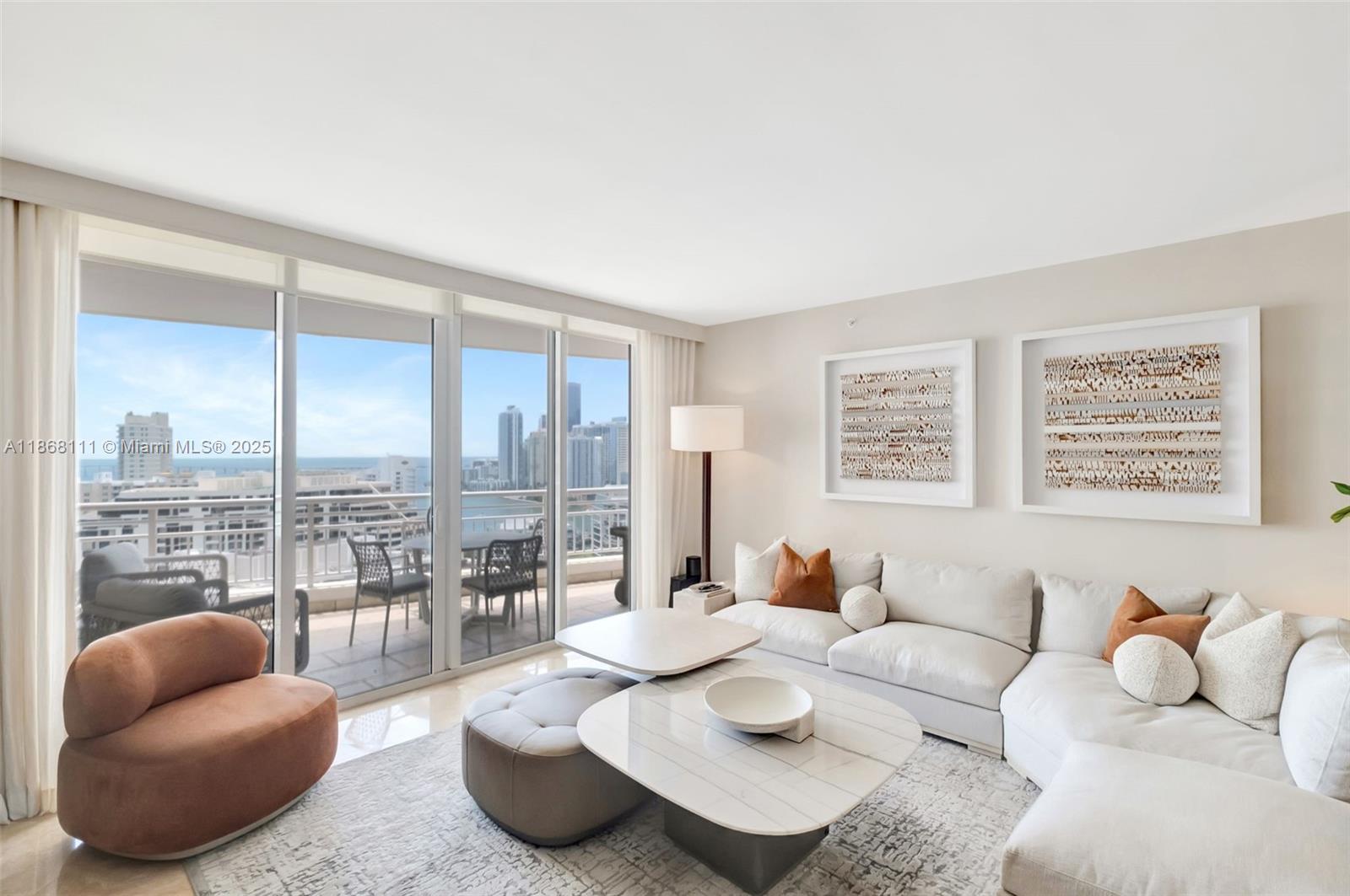 Experience this 2 bed, 2.5 bath residence at Three Tequesta Point, offering nearly 1,700 sq ft with breathtaking views of Biscayne Bay, Key Biscayne, and the Brickell skyline. The remodeled kitchen showcases quartz countertops, new stainless Samsung appliances, and sleek cabinetry. The ample living/dining area is framed by floor-to-ceiling windowed sliding doors opening to the generous balcony, while custom mirrors on the opposite wall reflect natural light and water views. The spacious primary suite, which opens to the balcony, offers two closets, including a walk-in closet, as well as a spa-inspired bath. Resort-style amenities include a bayfront pool, fitness center, spa, tennis, racquetball, concierge, and 24-hour security within the exclusive Brickell Key community.