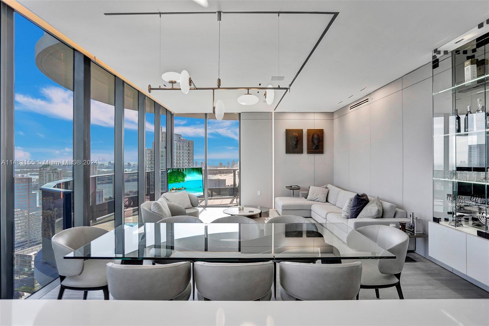 ACCEPTING BACKUP OFFERS! EASY TO SHOW/ SAME-DAY NOTICE OK! Rarely available corner penthouse residence boasting breathtaking views of the city skyline and the bay. Sold FULLY FURNISHED/TURNKEY with high-end Italian-imported Artefacto furniture. A surround sound system is installed throughout the unit's ceilings. Flushed ceiling lights, custom cabinetry, custom wallpaper placed throughout, a wine rack, electric blinds, smart home devices, and more additions! Two express destination elevators are available for the PH floors. 3 Parking spots (2 assigned + 1 valet) with an EV charger placed in one of the designated spots. 64th-Floor Rooftop Pool w/ Towel Service, rooftop restaurant, steam room, sauna, gym, lap Pool, children's Pool, theater, billiards Room. Video Available upon request.