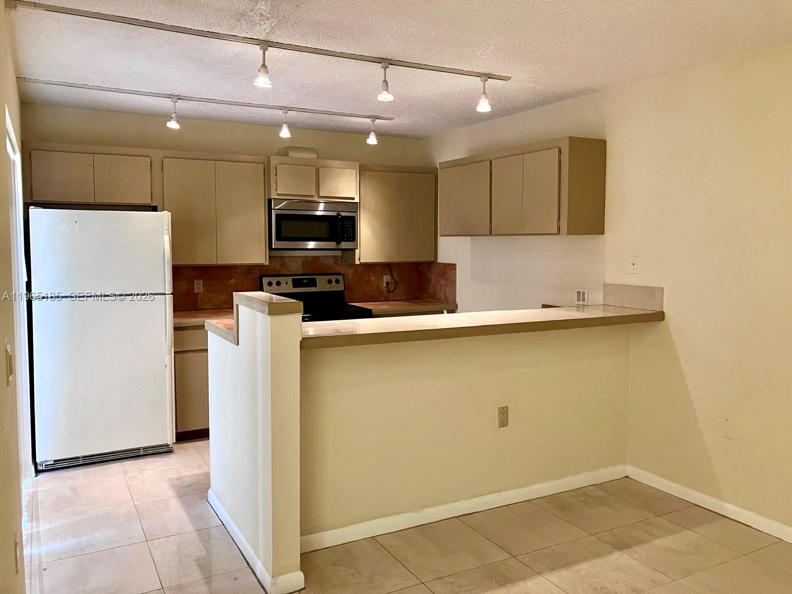 Beautifully townhouse 2-bedroom, 2.5-bath townhouse featuring a well-designed floor plan and comfortable living spaces. This residence offers a bright and open living and dining area, a functional kitchen layout, and generously sized bedrooms.The property includes two assigned parking spaces and is ideally situated in a prime West Palm Beach location, close to shopping, dining, schools, and everyday conveniences.The unit is currently leased through March 2027. A great opportunity for an investor seeking a well-located, income-producing property with long-term value.