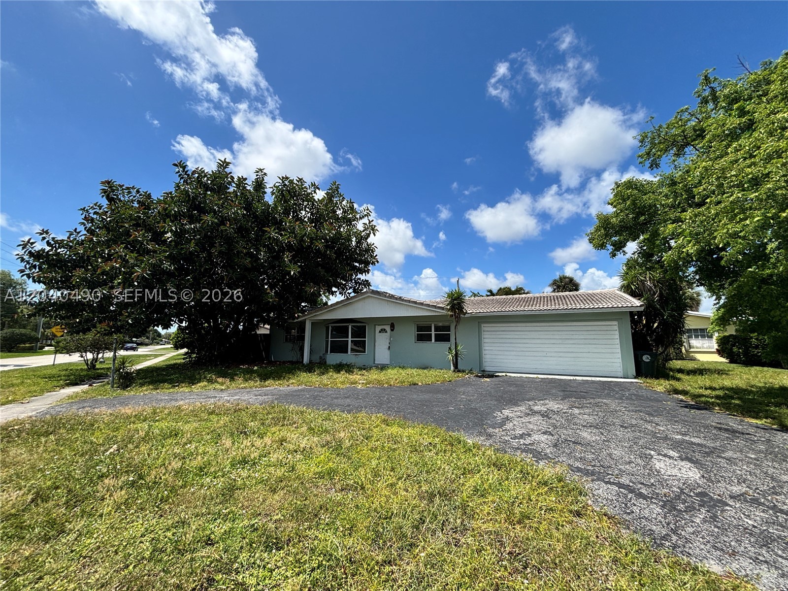 Investor special in beautiful neighborhood in Coconut Creek. Large corner lot with circular driveway. No HOA! Room for RV or boat parking. Needs work, but has lots of potential. Close to Turnpike and Lyons Rd. Close to parks, boat ramp, schools, and Broward College. 3 miles to the Promenade of Coconut Creek shops and restaurants. 3.5 miles and in between Coconut Creek Casino and Pompano Beach Casino. 6.5 miles and 20 minutes to the beach. Don't miss this rehab opportunity. Cash buyers only due to condition.