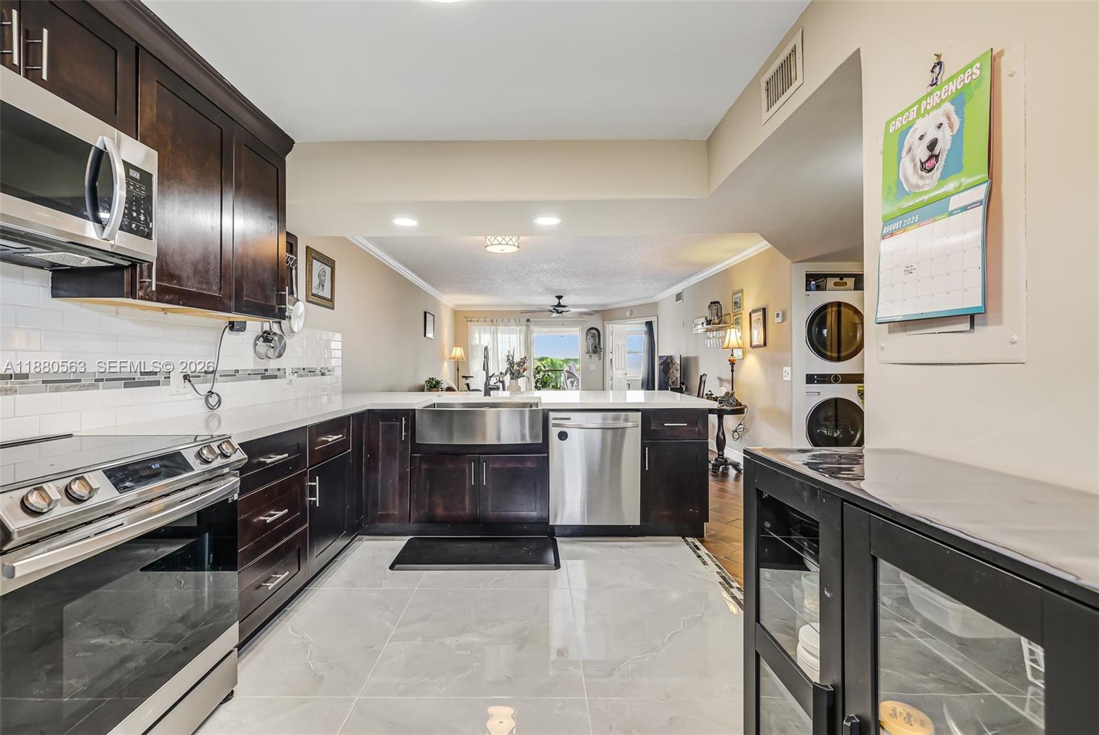 Carefree living awaits in this renovated 2BR/2BA condo in the active 55+ Sunrise Lakes community. The work has been done for you, step inside to find a modern kitchen, two updated bathrooms, newer washer and dryer and new flooring. The building is well-managed with excellent financials and healthy reserves. The lifestyle here is unmatched, centered around vast clubhouse offering a theater, swimming, tennis, and pickleball courts. Its prime Sunrise location offers quick access to Sawgrass Mall, FLL airport, and major travel routes. A turnkey home offering both an active social life and a sound investment.