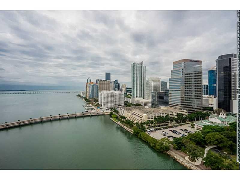 JUST REDUCED!  Seller motivated! Corner oasis in the city with beautiful water views.  Split Floor Plan with marble floors with 2 bedrooms and 2 bathrooms with separate laundry room.  1 assigned covered parking space # 347.  Great Building with ourstanding amenities including pool, gym,  kids club, tennis courts, security and valet.  Available  now.