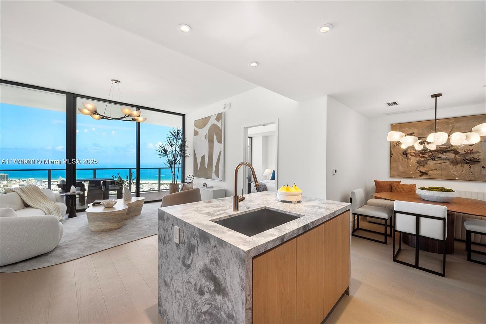 Breathtaking views from this 2-bedroom, 2.5 bathroom Canopy Residence. FIVE PARK Miami Beach unites timeless glamour with a new approach to development. A 48-story tower - the tallest in Miami Beach - with an array of services & amenities including a Five Park Beach Club located in the South of Fifth neighborhood with transportation provided by house car, and a three-acre shaded Canopy Park with Monstrum playground, outdoor gym, running track, dog park & more.