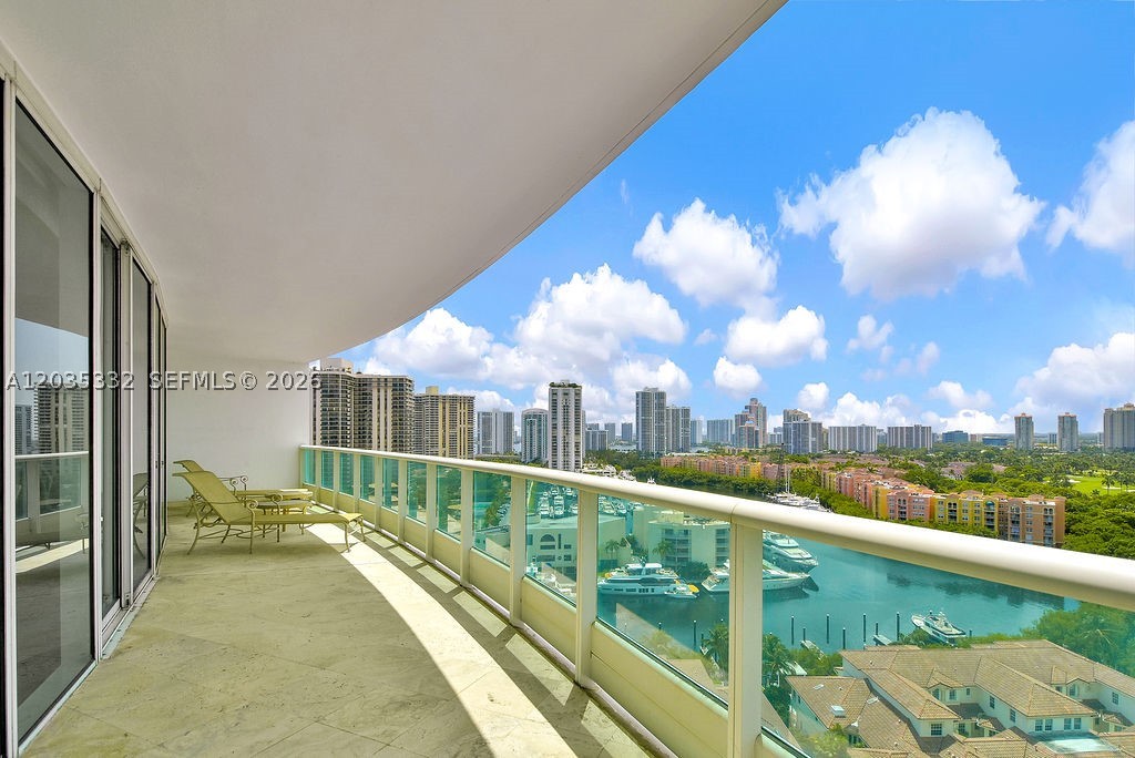 Enjoy this beautiful furnished 2 bedroom paradise in the sky, located in the most exclusive and luxurious community in Aventura. A full service building complete with a private full service country club with an array of amenities. This spectacular 2 bedroom plus den 3 1/2 bath; offers complete privacy with a resident/guest only elevator leading to your private foyer that opens directly into the living space. Incredible city and water views with expansive balconies overlooking the Turnberry golf course and marina. Includes 2 accompanied parking spots as well as the use of the complimentary valet for you and your guests. This residence has it all.